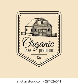 Vector retro farm logotype. Organic premium quality products badge. Eco food sign. Vintage hand sketched barn icon.