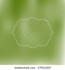 Vector retro green blurred unfocused background with a cute dotted badge
