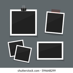 Vector retro photo frames sticked with paper tape and hanged with paper clip. Instant photo frame collection. Empty photo on dark back ground.