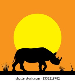 Vector of an Rhino silhouette with a African sky background