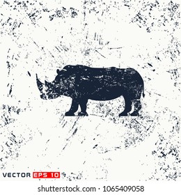 Vector rhino silhouette on grunge background