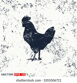 vector rooster silhouette on grunge background