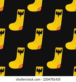 vector rough ethnic orange halloween sock brush stroke lines seamless pattern on black