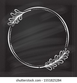 Vector round dotted frame with mistletoe leaf decoration on a chalkboard background. Christmas vintage style template.