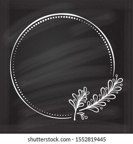 Vector round dotted frame with mistletoe leaf decoration on a chalkboard background. Christmas vintage style template.