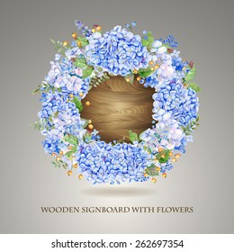 Vector round frame of blue watercolor hydrangea and berries on wooden background. Illustration wreath of flowers. Can be used as a greeting card for Valentine's day, birthday, mother's day and so on