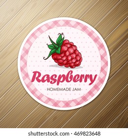 Vector round label,  raspberry jam on a wooden background