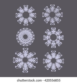 Vector rounded ornaments with floral elements for invitation, and greeting card. set of ornate monograms