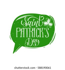 Vector Saint Patrick's Day hand lettering greetings card or poster. Ornate calligraphy in speech bubble for irish holiday design concepts. Festive typography on green background. 