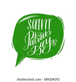 Vector Saint Patrick's Day hand lettering greetings card or poster. Ornate calligraphy in speech bubble for irish holiday design concepts. Festive typography on green background. 