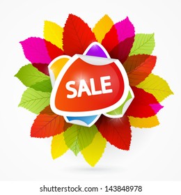 Vector Sale heading placed on yellow, green, red, violet and orange leaves