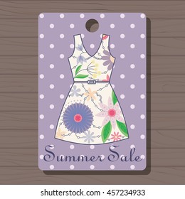 Vector sale label with dress vintage on wooden background