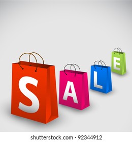 Vector sale poster made from colorful paper shopping bags