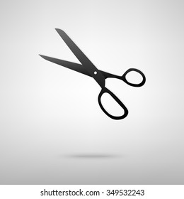 Vector scissors on white background
