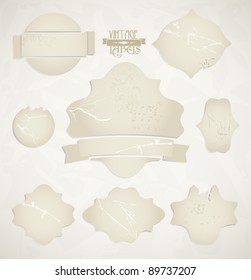 Vector scratched vintage labels set