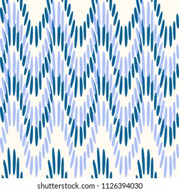 Vector seamless abstract background in pastel tones zigzags of light blue and gray spots of oval shape pattern for design of fabric, paper