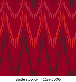 Vector seamless abstract background of warm autumn tones zigzags of red maroon spots of oval shape pattern for paper design  hijab, shawls tapestry and panties fabric