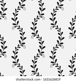 Vector seamless abstract pattern with black vertical branches and leaves on white background; floral abstract design for fabric, wallpaper, textile, web design.