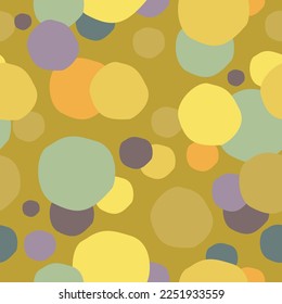 Vector seamless abstract pattern. Colorful circles on light yellow background. Soft geometric shapes. Pastel colors.