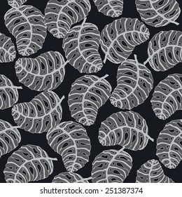 Vector seamless abstract pattern of dark grey stylized monstera leaves on black background