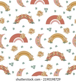 Vector seamless abstract pattern with rainbow, moon, and flowers. Can be used as background printed, for bed linen design, packaging design.