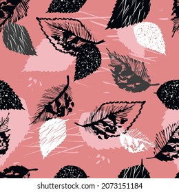 Vector seamless abstract pattern with textured leaves black,white,grey colors on pink background.Modern endless wallpaper with foliage.Botanical leaves texture.Vintage grunge print for textile design.