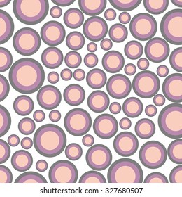 Vector seamless abstract texture with circles of different sizes and colors on a white background