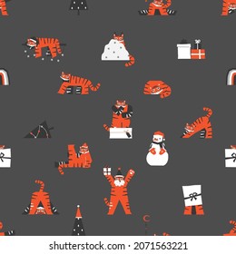 Vector seamless animal pattern with orange Asian tigers on grey background. Design for textile or wrapping paper. Flat characters - symbol of Chinese New Year 2022. Funny tigers wear Santa hats, play