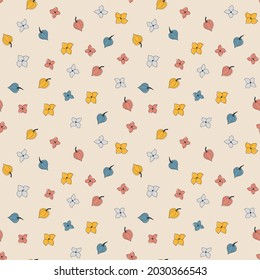 Vector seamless autumn pattern of cute tiny orange, red, blue, and grey leaves and flowers stylized in a flat and doodle style in the light background. Hand-drawn leaf texture. Background for textile 