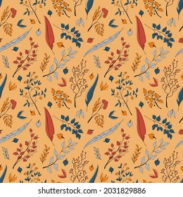 Vector seamless autumn pattern of cute tiny orange, red, blue, and grey leaves and feathers stylized in a flat and doodle style in the orange background. Hand-drawn leaf texture.Background for textile