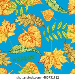 Vector seamless autumn pattern with leaves. Oak, rowan, maple, hazelnut and linden leaves. Hand drawn illustration for print, textile, wrapping and other seamless seasonal design. Yellow on blue sky.