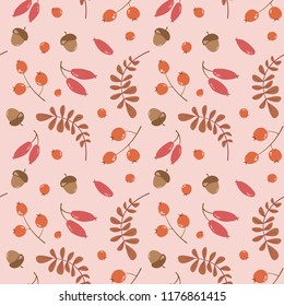 Vector seamless autumn pattern with red leaves, acorns and berries on a light red background. Autumn collection. Flower graphic design. Hand drawn vector botany texture. 