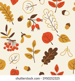 Vector seamless autumn plant pattern on isolated background. Leaves,berries,acorns,seeds of yellow, red, brown color. The illustration is suitable for fabric, gift paper, background.