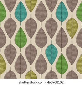 vector seamless background with autumn colored leaves