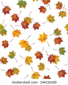 Vector seamless background of autumnal leaves.