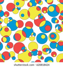 Vector seamless background with bright colorful circles.