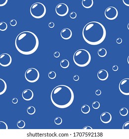 Vector seamless background with bubbles on a blue background.