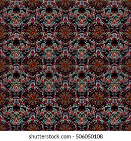 Vector seamless background. Colored patterns antique. Floral ornament in brown colors on a black background.