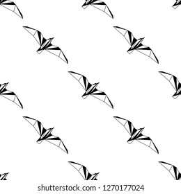 Vector seamless background with flying seagulls. Modern polygonal  design. Origami birds. Flat design pattern 
