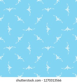Vector seamless background with flying seagulls. Modern polygonal  design. Origami birds. Flat design pattern 