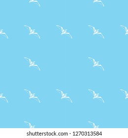 Vector seamless background with flying seagulls. Modern polygonal  design. Origami birds. Flat design pattern 