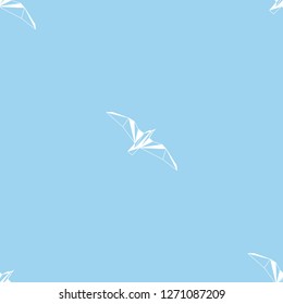 Vector seamless background with flying seagulls. Modern polygonal  design. Origami birds. Flat design pattern 