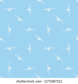 Vector seamless background with flying seagulls. Modern polygonal  design. Origami birds. Flat design pattern 