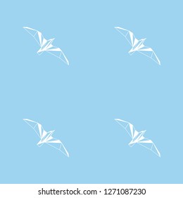 Vector seamless background with flying seagulls. Modern polygonal  design. Origami birds. Flat design pattern 