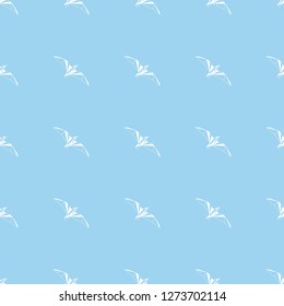 Vector seamless background with flying seagulls. Modern polygonal  design. Origami birds. Flat design pattern 
