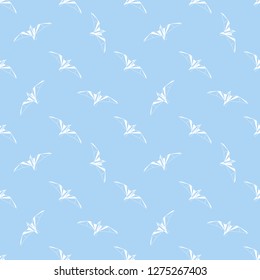 Vector seamless background with flying seagulls. Modern polygonal  design. Origami birds. Flat design pattern