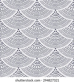Vector seamless background in the form of fish scales consisting of blue stars. The fountain of the stars on white .