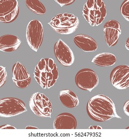 Vector seamless background with nuts on grey. Ink drawn healthy food illustration in sketch style for textile, wrapping, print, menu and other seamless food design.