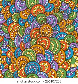 Vector seamless background of overlapping colored striped circles