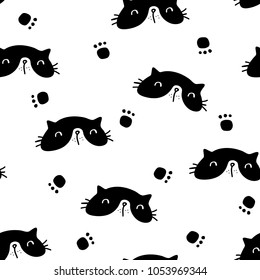 Vector seamless background pattern with cats and paws